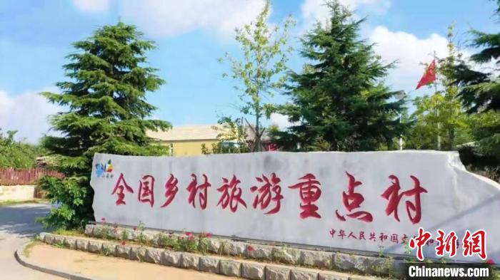 图为小南村一景。杨毅 摄 图为小南村一景。杨毅 摄