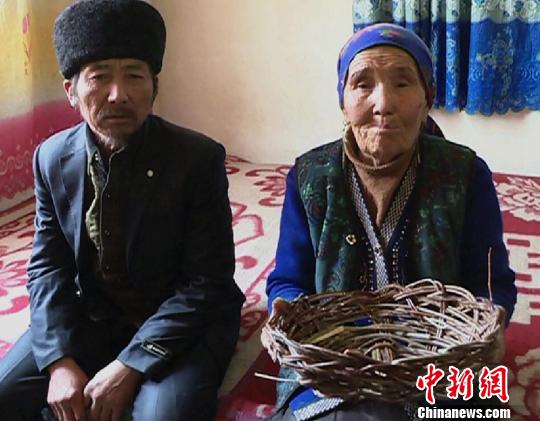 郭文生和再纳普罕？阿西木。杨婷婷 摄